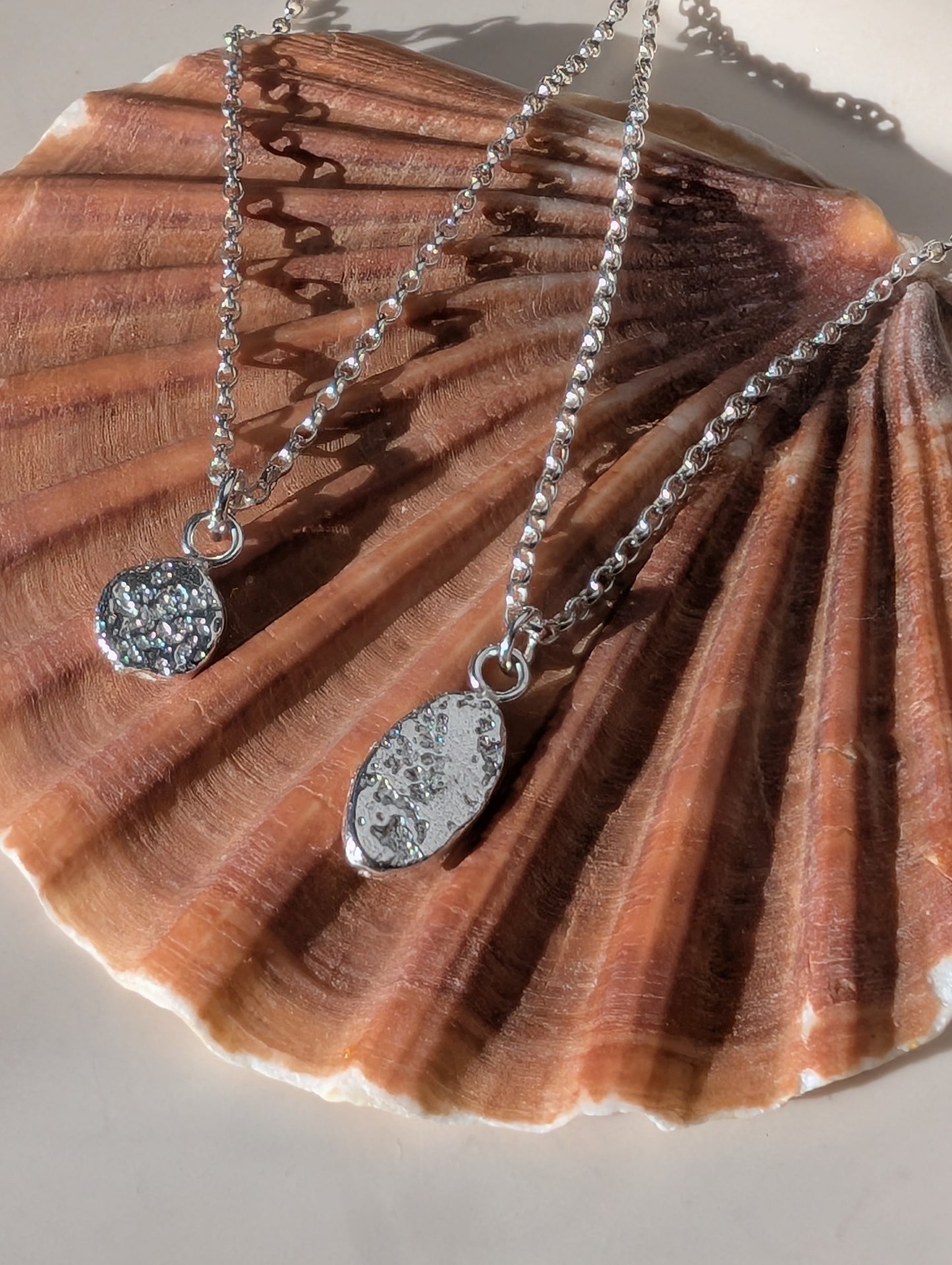 Sandcast silver oval pendant