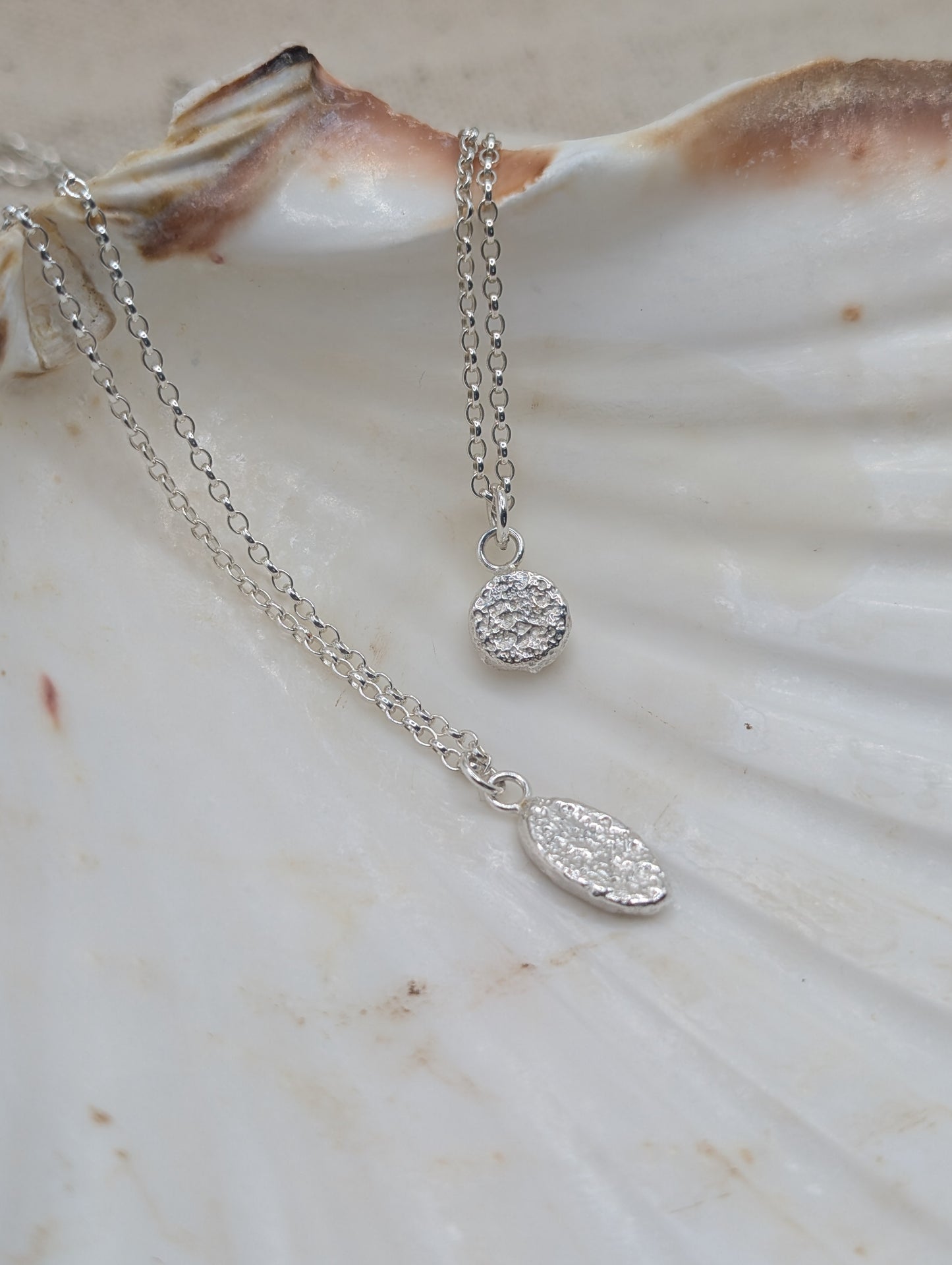 Sandcast disc necklace